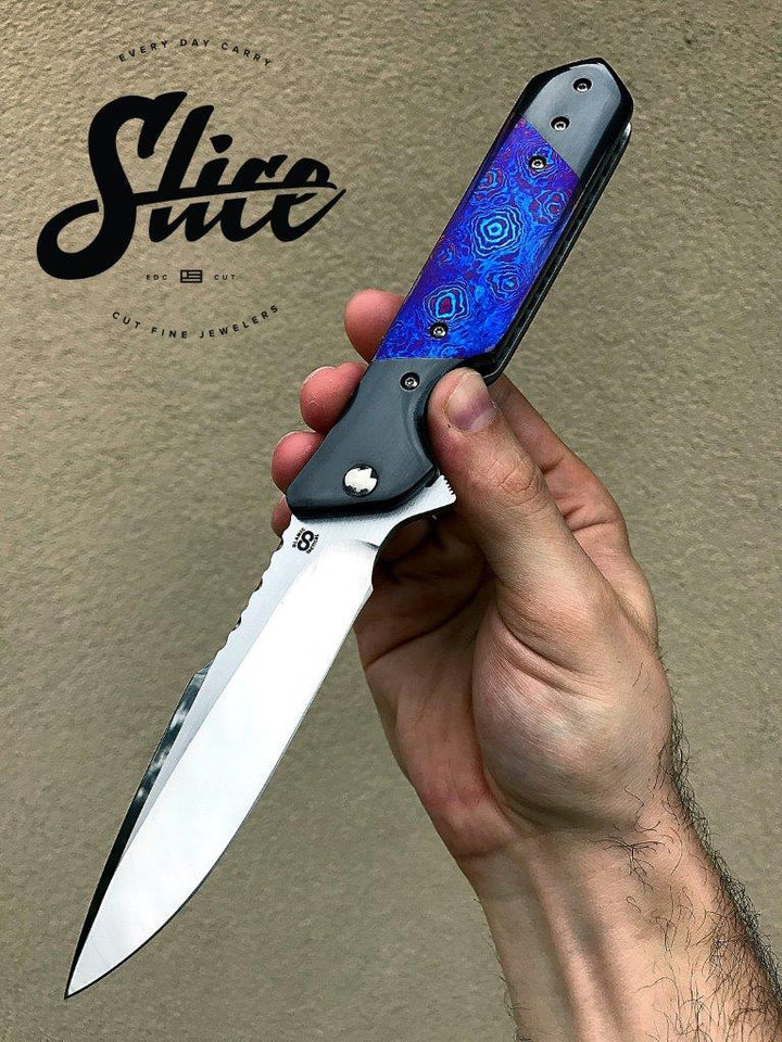 **SOLD** Olamic Rainmaker with zirconium and timascus.