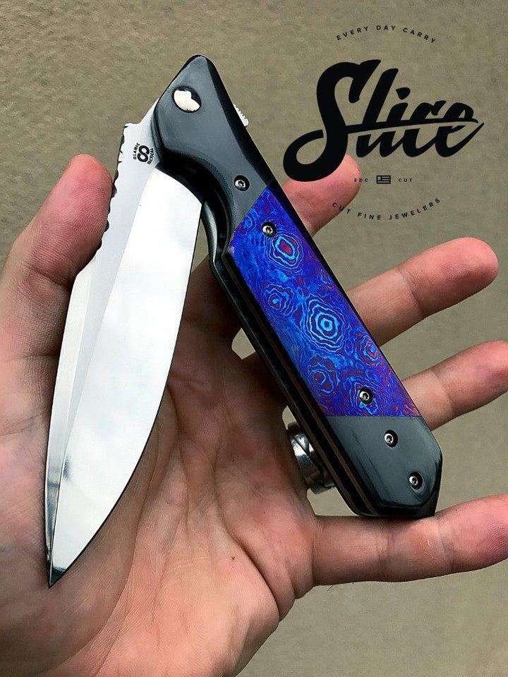 **SOLD** Olamic Rainmaker with zirconium and timascus.