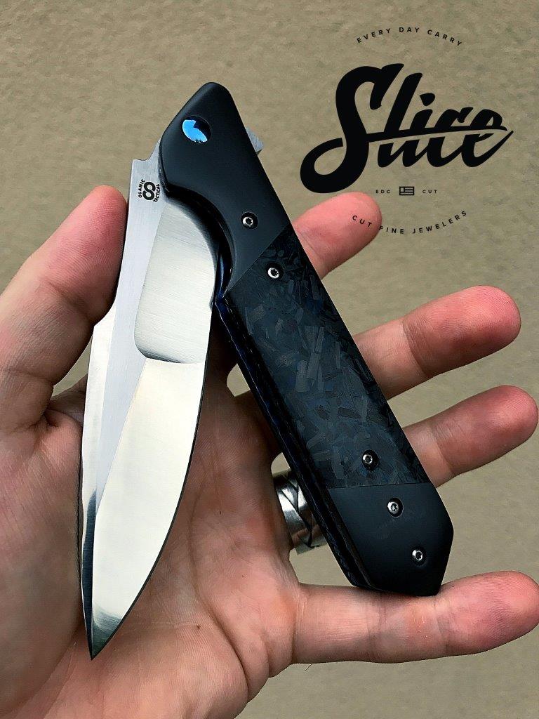 **SOLD** Olamic Rainmaker with zirconium and blue shred carbon fiber.