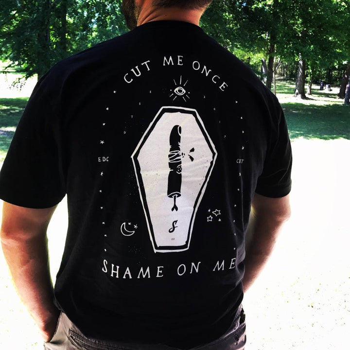 Cut me once, shame on me finger coffin t-shirt.